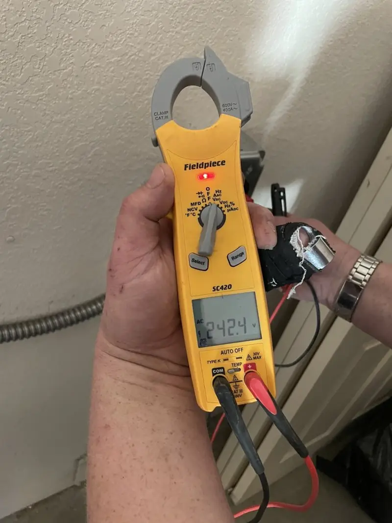 Voltage testing with clamp meter during Electrical Installation Services in Jacksonville Beach